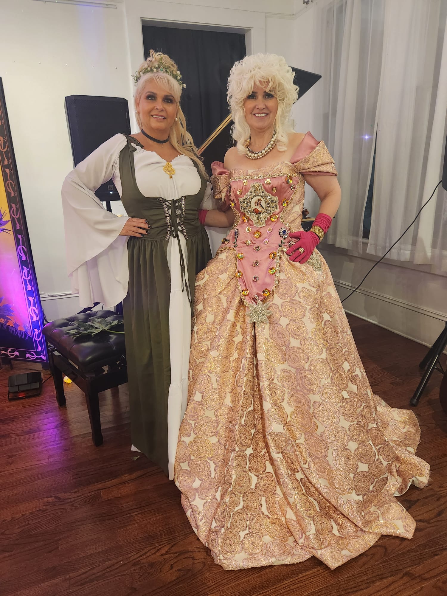Two women in elaborate Victorian ballgowns